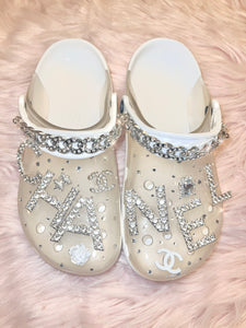 Size 7 White/Translucent Glam Crocs.